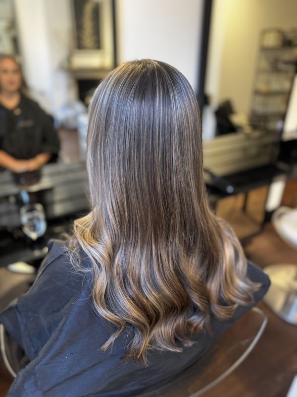 Ash brunette with softly curled ends