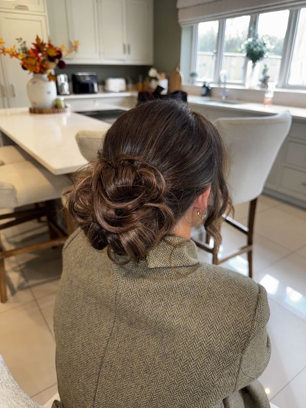 Relaxed low bun, styled on location