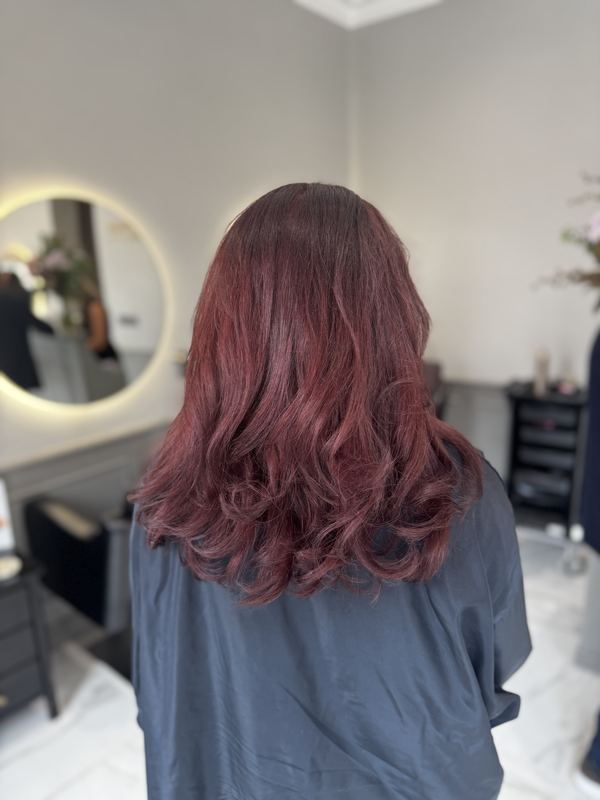 Deep berry-burgundy curls